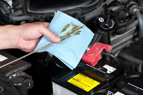 Check the engine oil dipstick for the presence of water