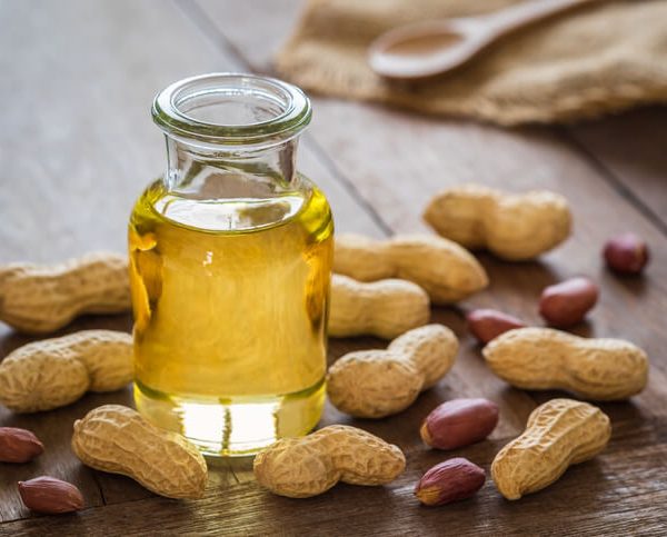 A jar of peanut oil that can be used as fuel by a diesel mechanic training grad