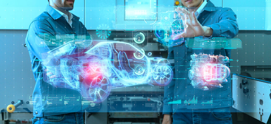 An Instructor guiding students through AR-assisted vehicle repair at CATI school