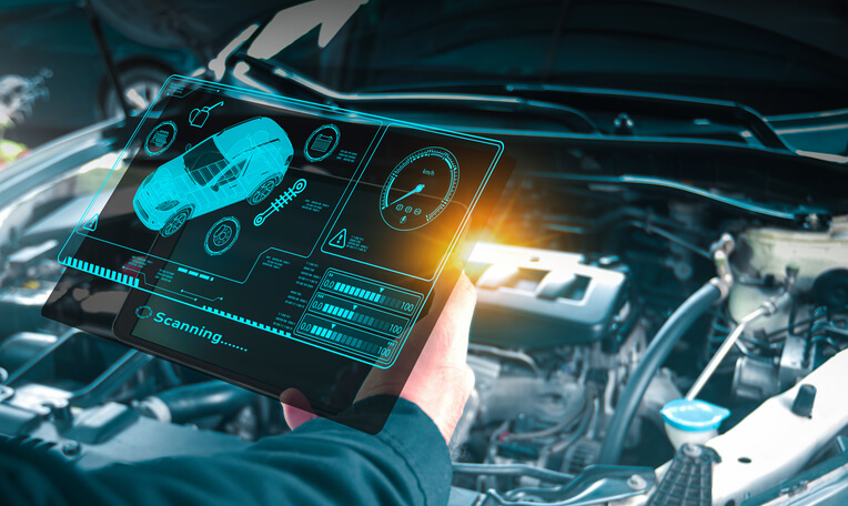 A connected OBD-II scanner displaying advanced diagnostic alerts