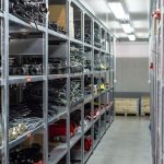 Auto parts warehouse shelves with spare components ready for storage and distribution