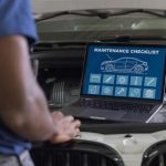 An automotive student diagnosing a vehicle that stalls at an intersection