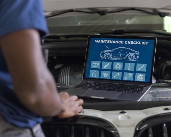 An automotive student diagnosing a vehicle that stalls at an intersection